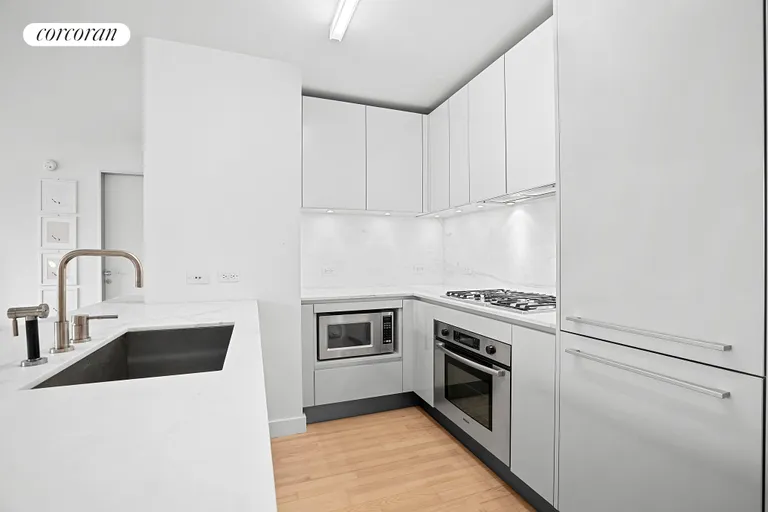 New York City Real Estate | View 322 West 57th Street, 54P | Kitchen | View 3