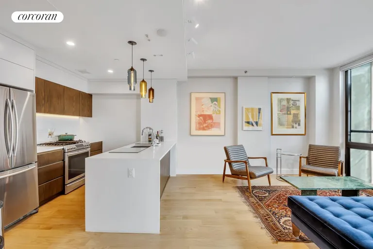 New York City Real Estate | View 2100 Bedford Avenue, 8E | Living Room/Kitchen | View 3