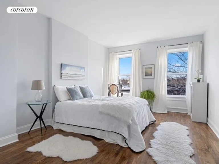 New York City Real Estate | View 302 Lafayette Avenue, 2 | Tranquil Bedroom overlooking Garden | View 2