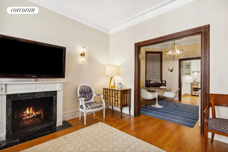 New York City Real Estate | View 120 East 85th Street, 2E | Living Room into Dining Room | View 3
