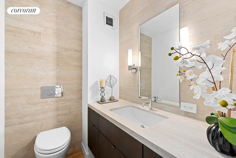 New York City Real Estate | View 421 Hudson Street, 824 | Half Bathroom | View 6