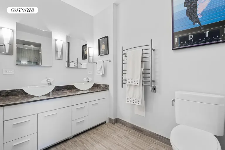 New York City Real Estate | View 101 West 24th Street, 23B | Primary Bathroom | View 8