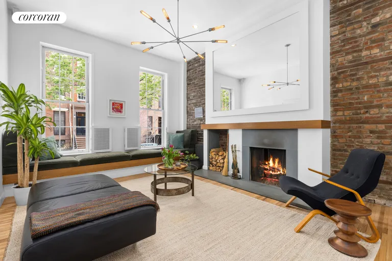 New York City Real Estate | View 326 West 22ND Street, GARDENDUPL | Parlor with Wood Burning Fireplace | View 3