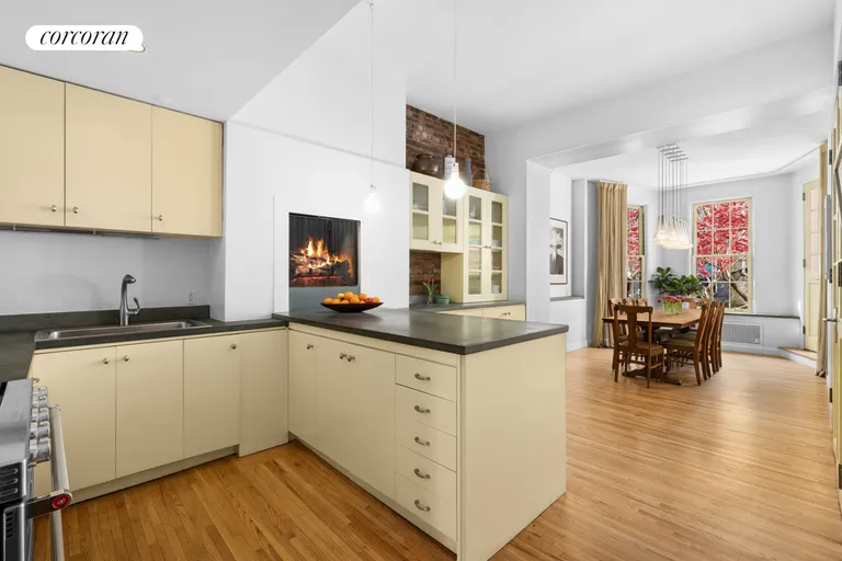 New York City Real Estate | View 326 West 22ND Street, GARDENDUPL | Kitchen to Dining Room Garden Views | View 8