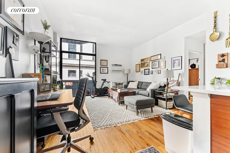 New York City Real Estate | View 184 Thompson Street, 1M | Living Room | View 2