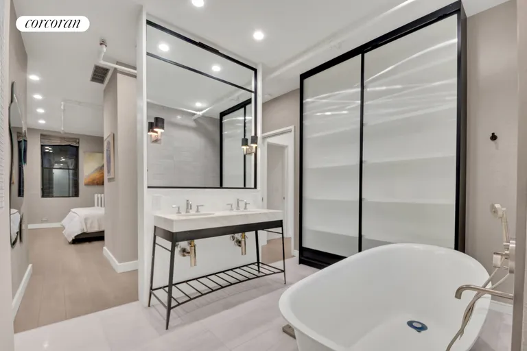 New York City Real Estate | View 12 West 18th Street, 4E | Primary Bathroom | View 9