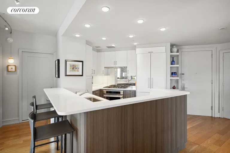 New York City Real Estate | View 1280 Fifth Avenue, 14D | Custom kitchen with breakfast bar | View 3