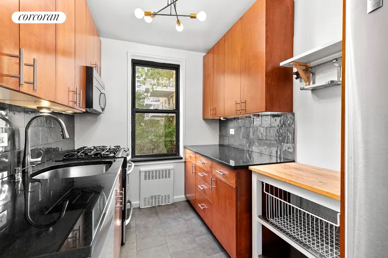 New York City Real Estate | View 30 East 9th Street, 2D | Windowed Kitchen - Virtually Staged | View 6