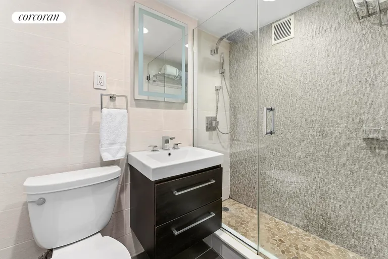 New York City Real Estate | View 220 East 57th Street, 11E | Bathroom | View 4