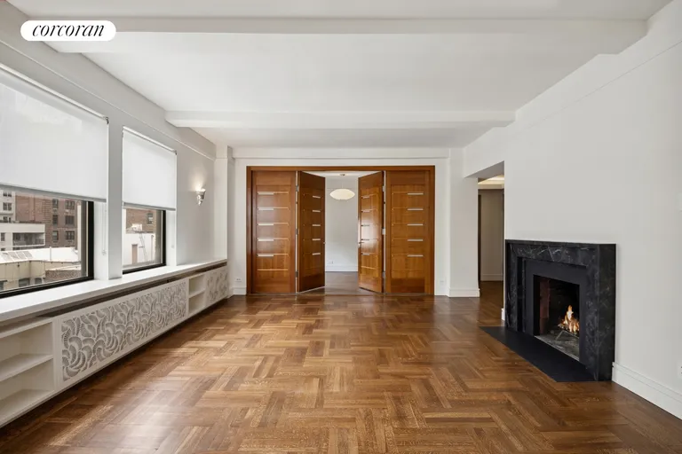 New York City Real Estate | View 55 East 86th Street, 9C | Living Room opens to 3rd BR/Den | View 2