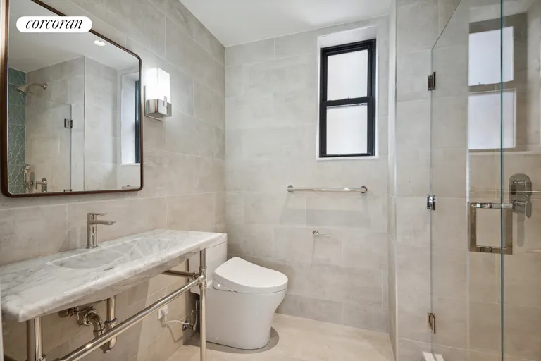 New York City Real Estate | View 55 East 86th Street, 9C | Marble Bathroom | View 7