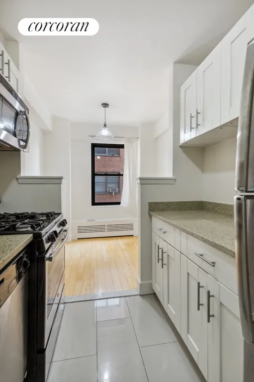 New York City Real Estate | View 345 West 145th Street, 10B2 | Windowed kitchen with dining area | View 4