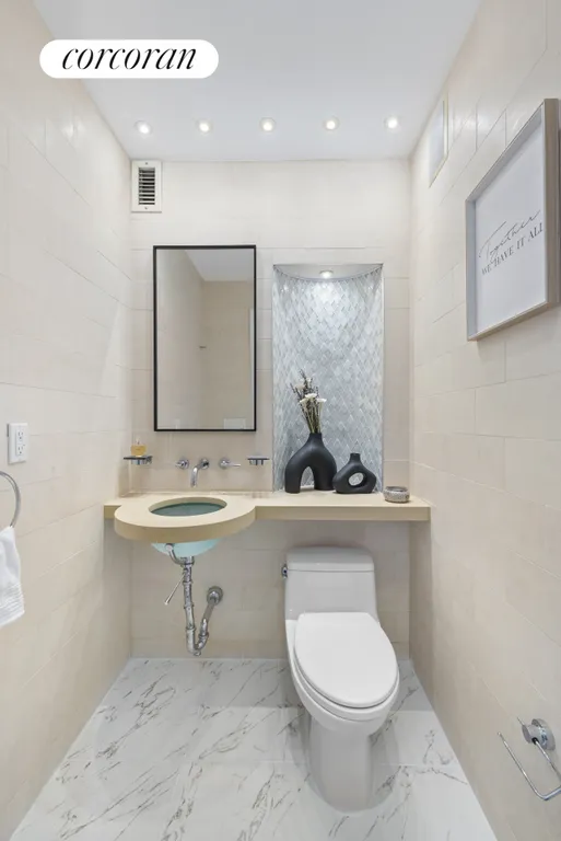New York City Real Estate | View 22 West 15th Street, 9AB | Half Bathroom | View 12