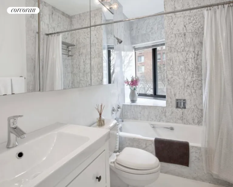 New York City Real Estate | View 380 Rector Place, 2M | Windowed Bath | View 6