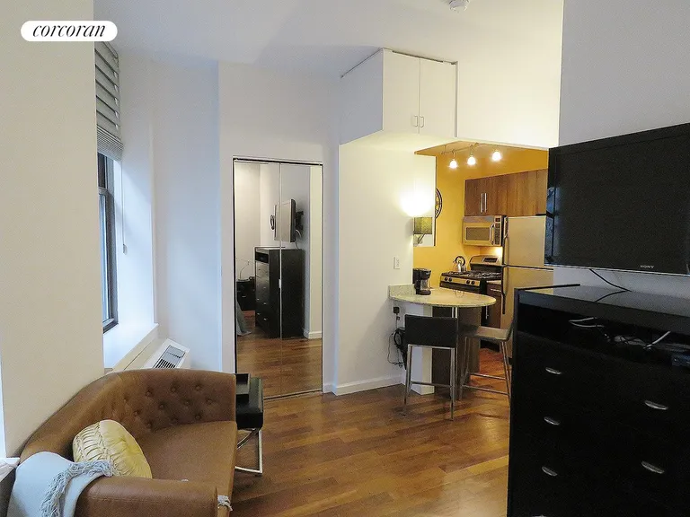 New York City Real Estate | View 1 Wall Street Court, 1006 | Living Room | View 2