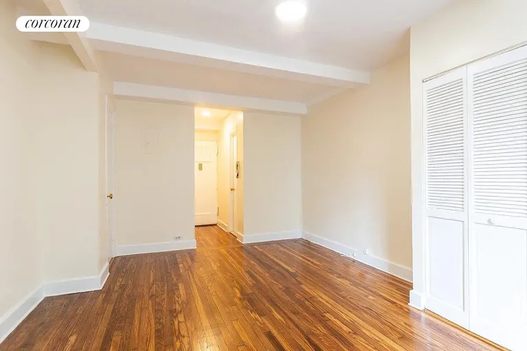 New York City Real Estate | View 25 Tudor City Place, 921 | Livingroom with Kitchenette closed | View 4