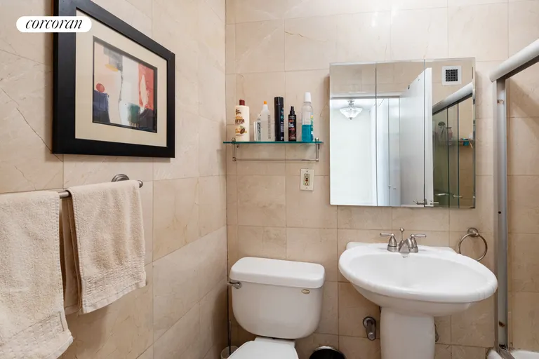New York City Real Estate | View 301 East 79th Street, 26S | Marble Bathroom | View 4