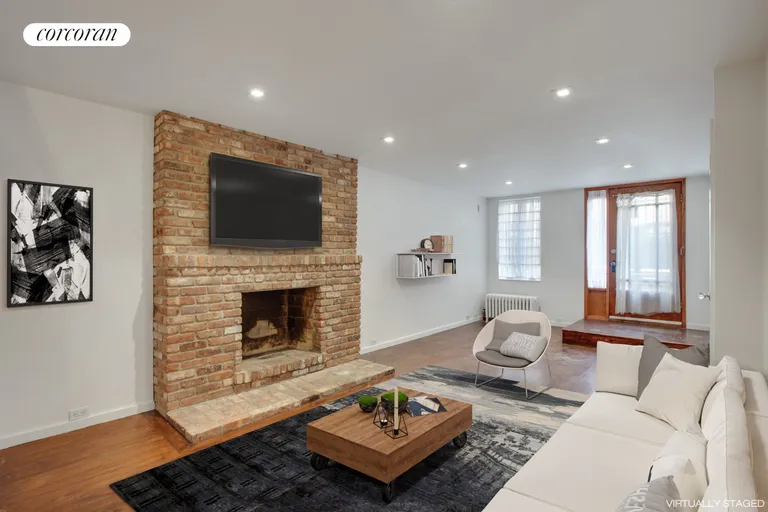 New York City Real Estate | View 114 Saint Marks Place, 1/2 | Living Room | View 3