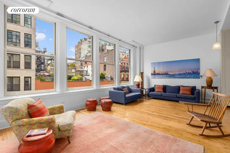 New York City Real Estate | View 55 East 11th Street, 6 | South Facing Living Room | View 4