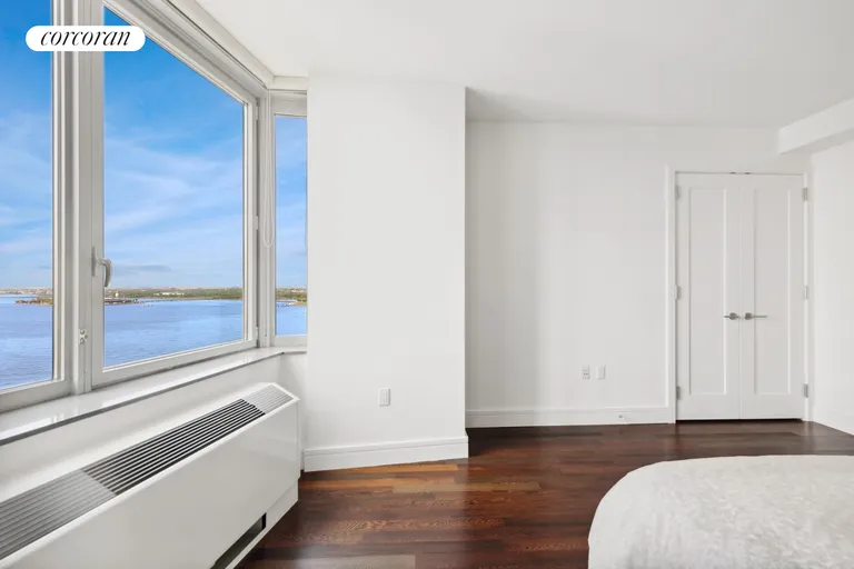 New York City Real Estate | View 30 West Street, 22E | Primary Bedroom | View 7