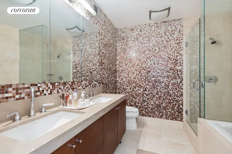 New York City Real Estate | View 30 West Street, 22E | Primary Bathroom | View 8