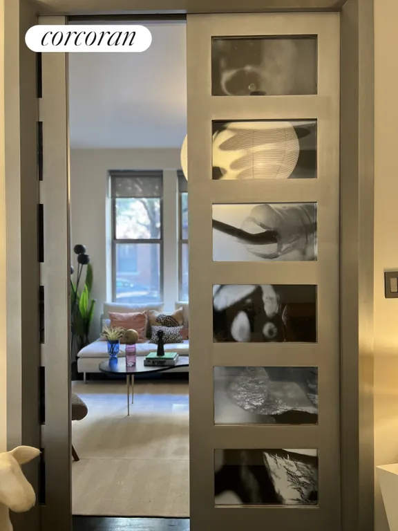 New York City Real Estate | View 234 West 21st Street, 2 | Artful Pocket French Doors | View 4