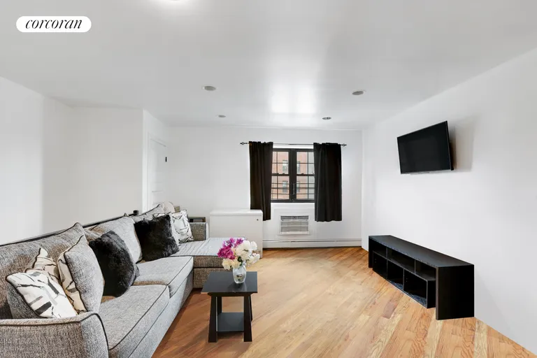 New York City Real Estate | View 342 Thomas S Boyland Street | Upper Apt Living Room | View 13