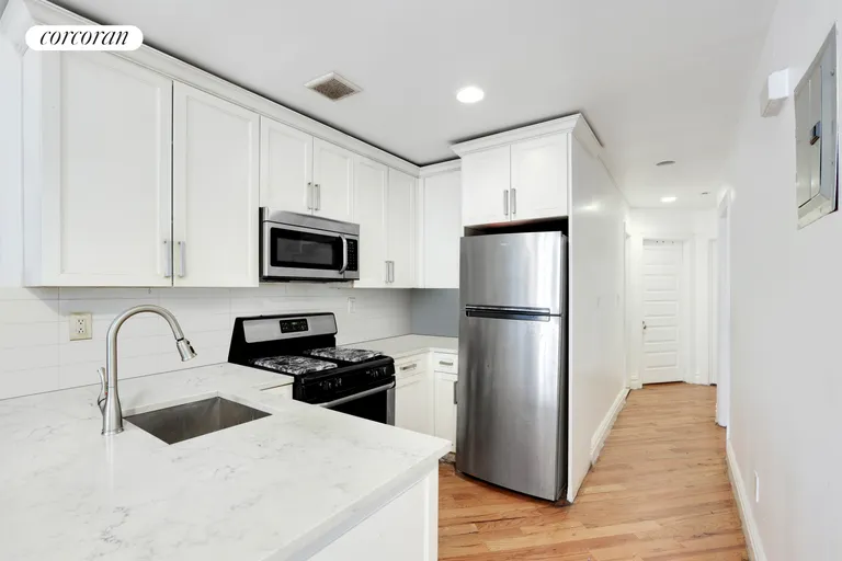 New York City Real Estate | View 342 Thomas S Boyland Street | Upper Apt Kitchen | View 15