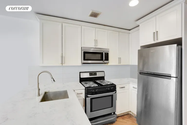 New York City Real Estate | View 342 Thomas S Boyland Street | Upper Apt Kitchen | View 16