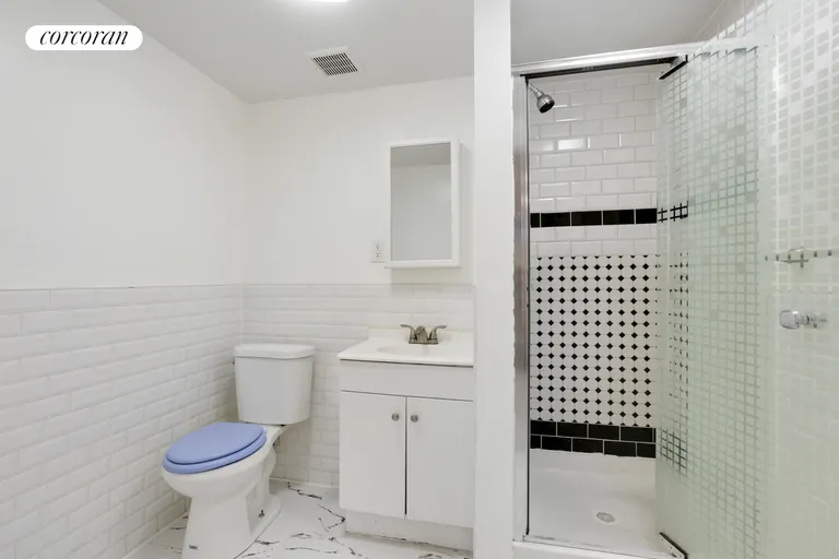 New York City Real Estate | View 342 Thomas S Boyland Street | Basement Bathroom | View 24