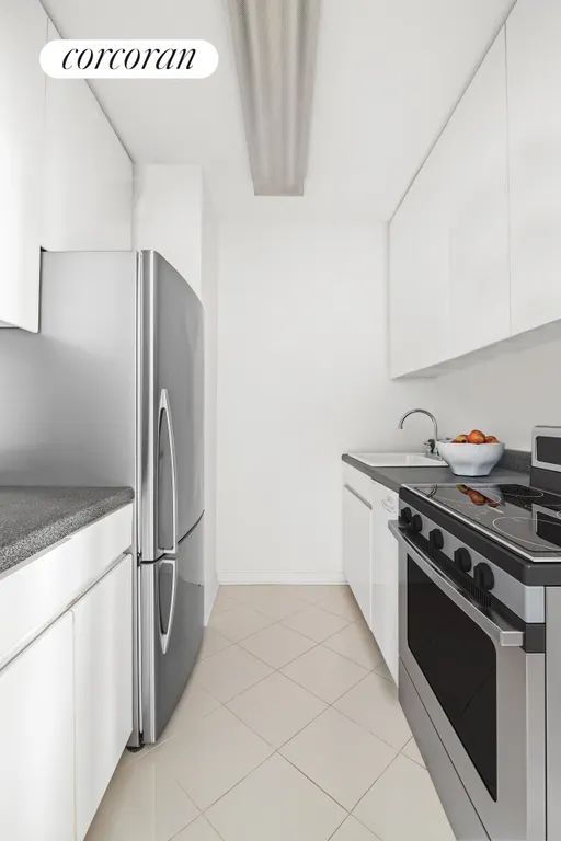 New York City Real Estate | View 300 East 54th Street, 23J | Kitchen with new appliances | View 8