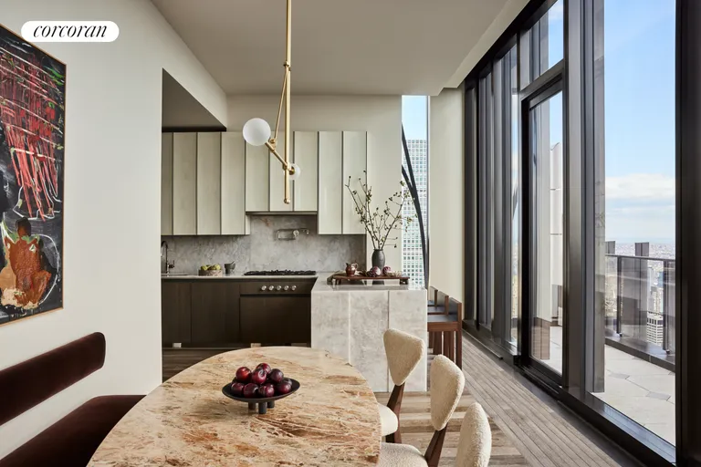 New York City Real Estate | View 111 West 57th Street, PH76 | Kitchen with adjacent terrace | View 4