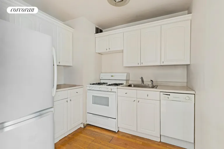 New York City Real Estate | View 225 East 86th Street, 806 | Modern kitchen with dishwasher | View 7