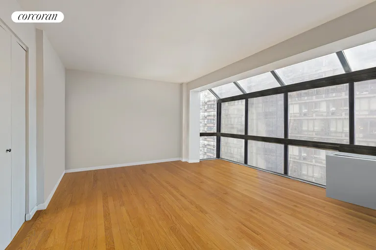 New York City Real Estate | View 225 East 86th Street, 806 | Large bedroom | View 4