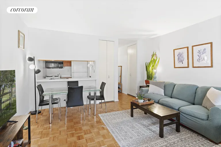 New York City Real Estate | View 393 West 49th Street, 2AA | Living Room | View 4