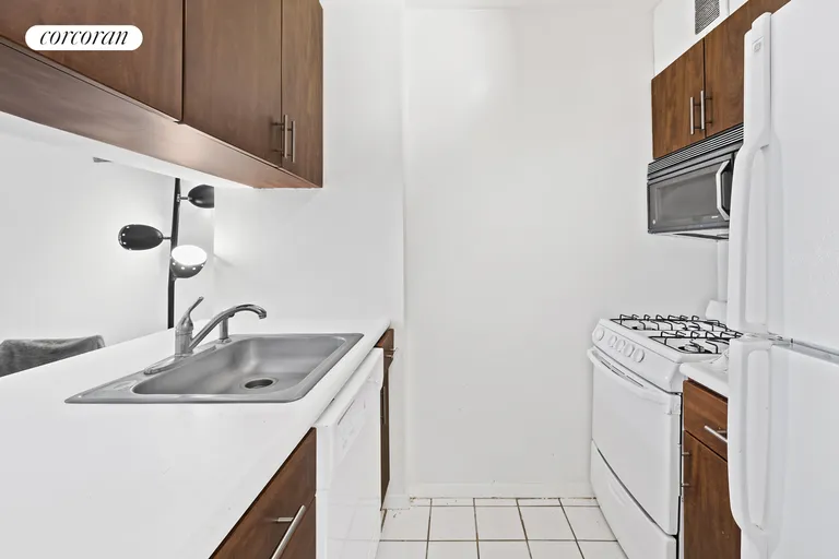 New York City Real Estate | View 393 West 49th Street, 2AA | Kitchen | View 8