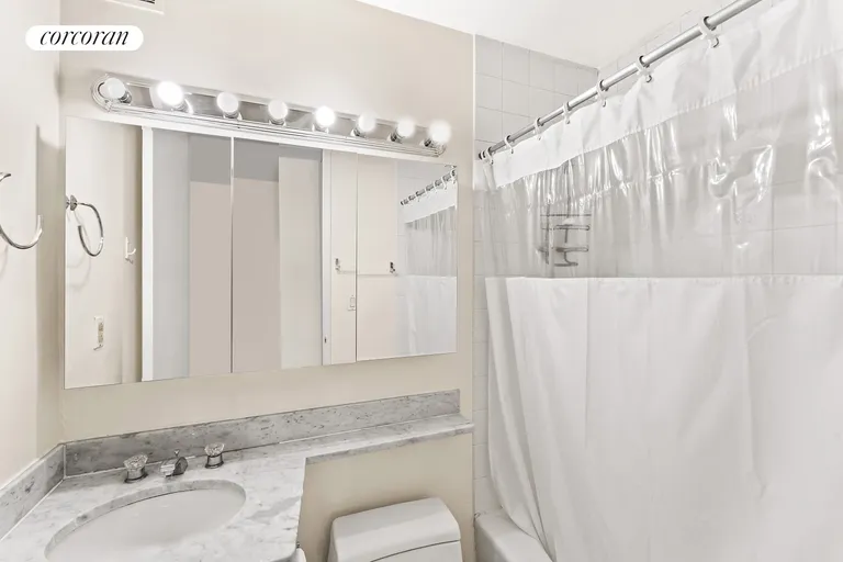 New York City Real Estate | View 393 West 49th Street, 2AA | Primary Bathroom | View 10