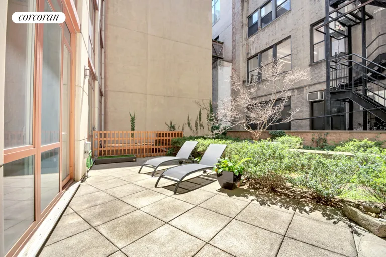 New York City Real Estate | View 130 West 20th Street, 1A | Private Garden Area | View 3