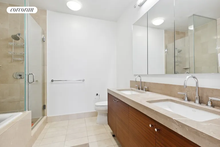 New York City Real Estate | View 30 West Street, 2B | Primary Bathroom | View 7