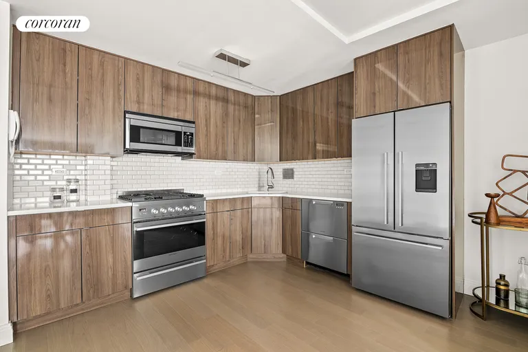 New York City Real Estate | View 245 East 87th Street, 7D | Renovated open kitchen | View 2