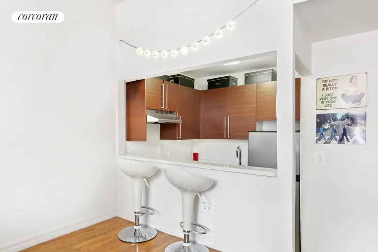 New York City Real Estate | View 184 Thompson Street, 3T | Kitchen Passthrough | View 2