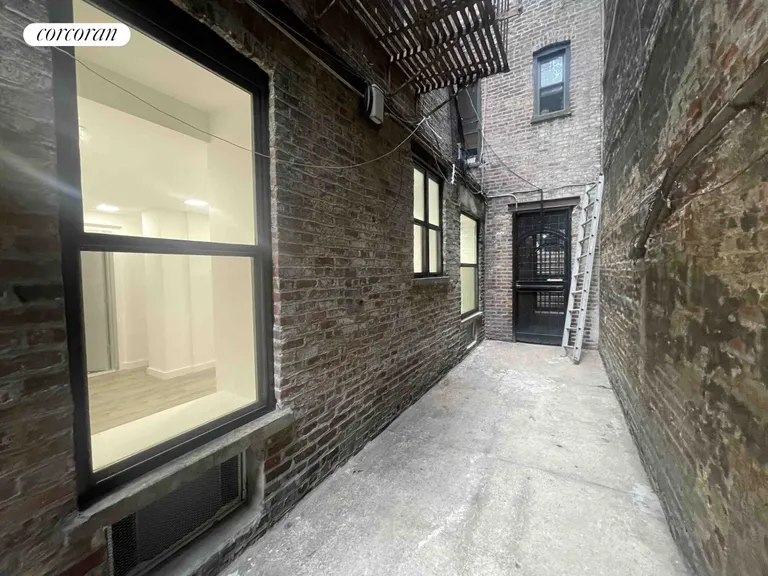 New York City Real Estate | View 128 West 13th Street, COMM | Side Alley | View 9