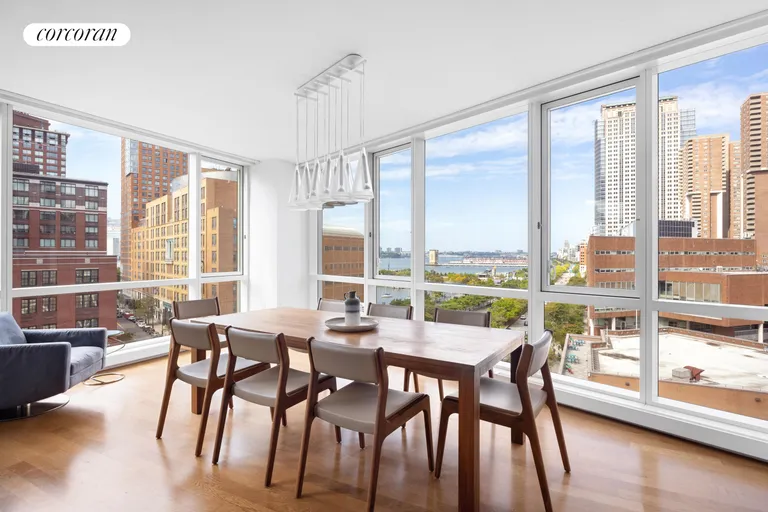 New York City Real Estate | View 200 Chambers Street, 8C | Dining area with river views | View 2
