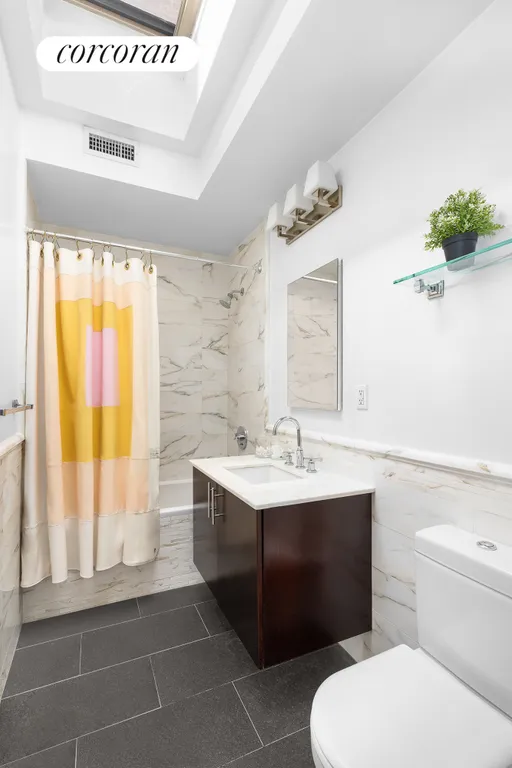 New York City Real Estate | View 246 Hall Street | Second Bath with Skylight! | View 11