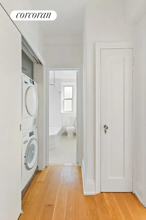 New York City Real Estate | View 172 West 79th Street, 15F | Bathroom and Washer Dryer | View 11
