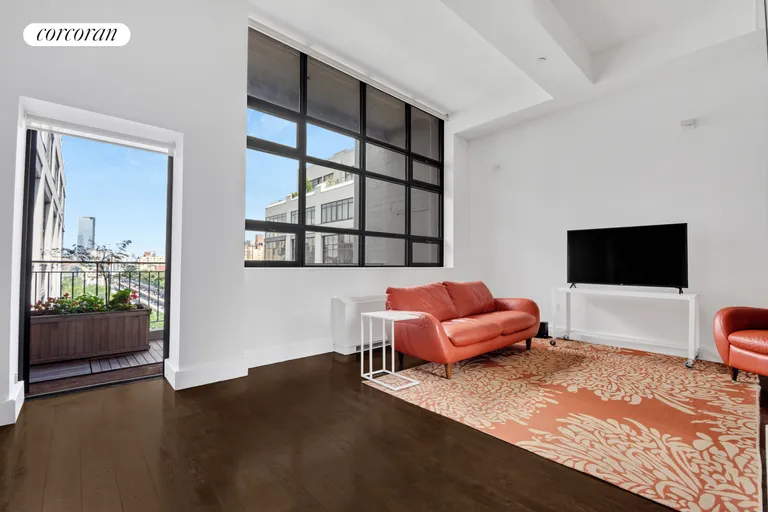 New York City Real Estate | View 360 Furman Street, 1020 | Living Room leading to Terrace | View 5