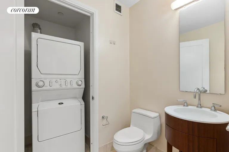 New York City Real Estate | View 30 West Street, 26D | Powder Rm/Laundry Rm | View 8