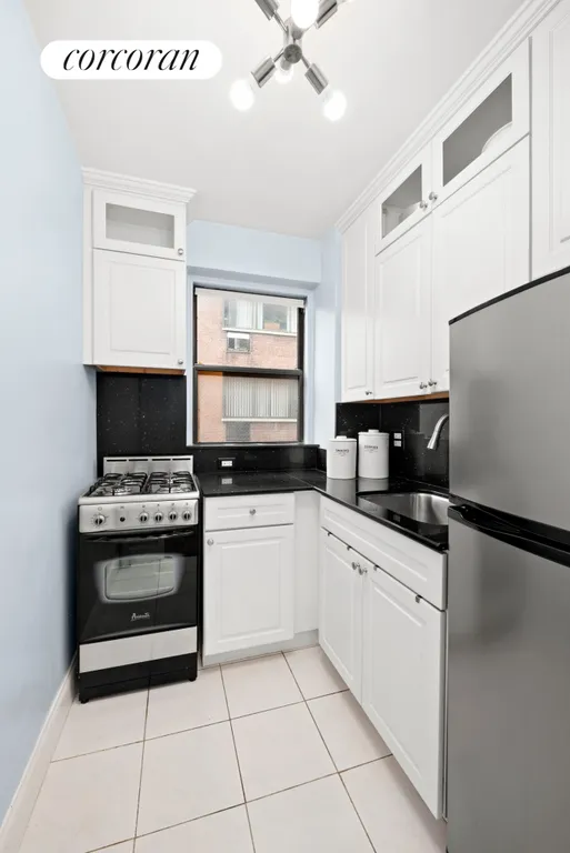 New York City Real Estate | View 210 East 36th Street, 8D | Kitchen | View 5