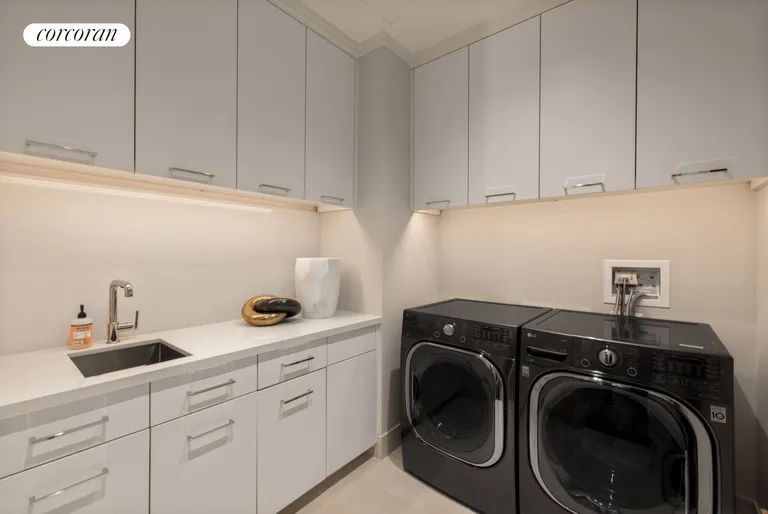 New York City Real Estate | View 220 Central Park South, 39A | Laundry Room in Apt | View 19