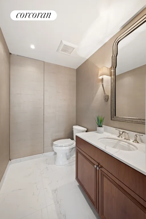 New York City Real Estate | View 301 West 57th Street, 49A | Half Bathroom | View 13